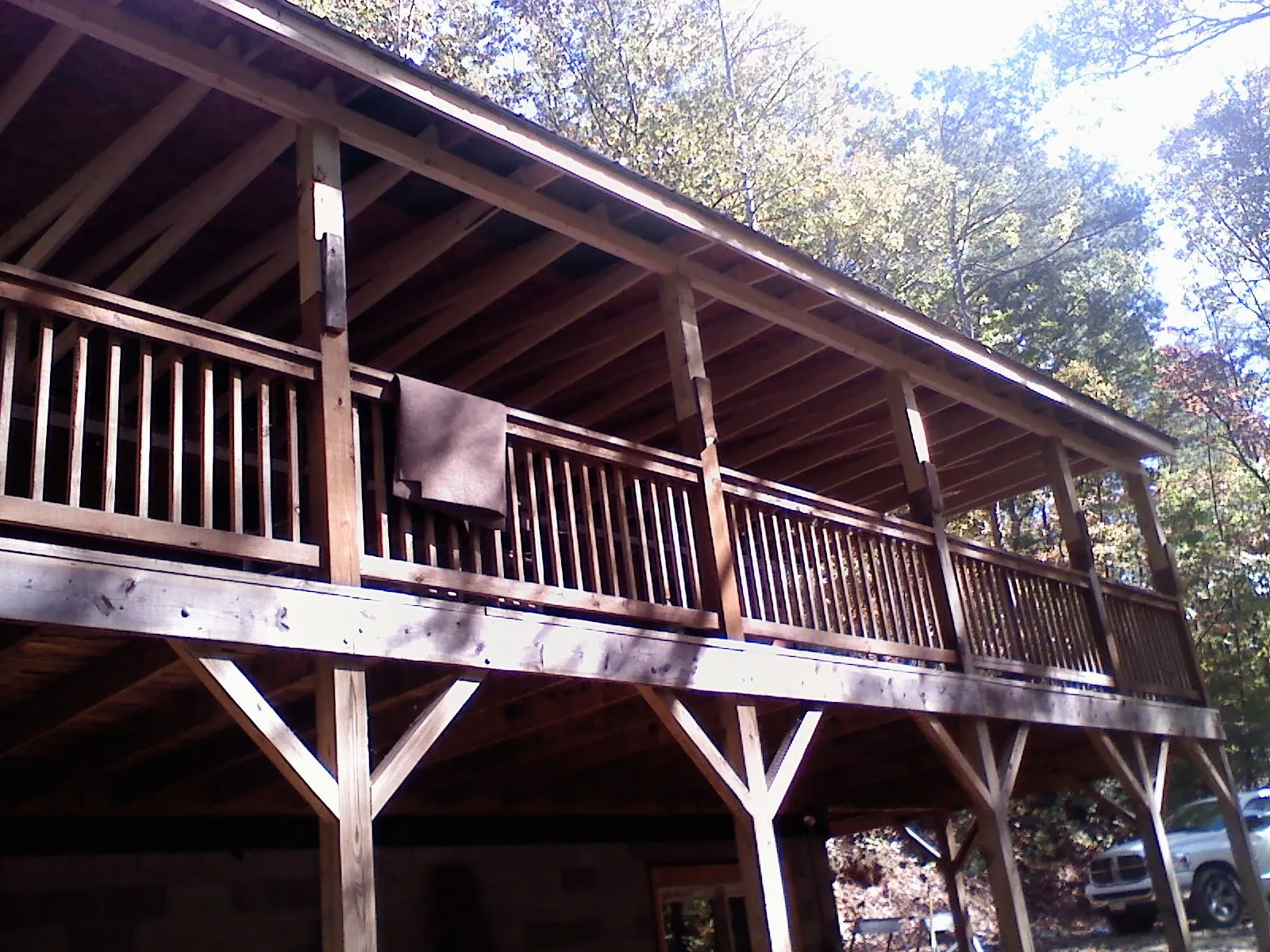 Timber framing under a new elevated porch and deck — Roof Leak Repair in Garfield by Roofing Brothers